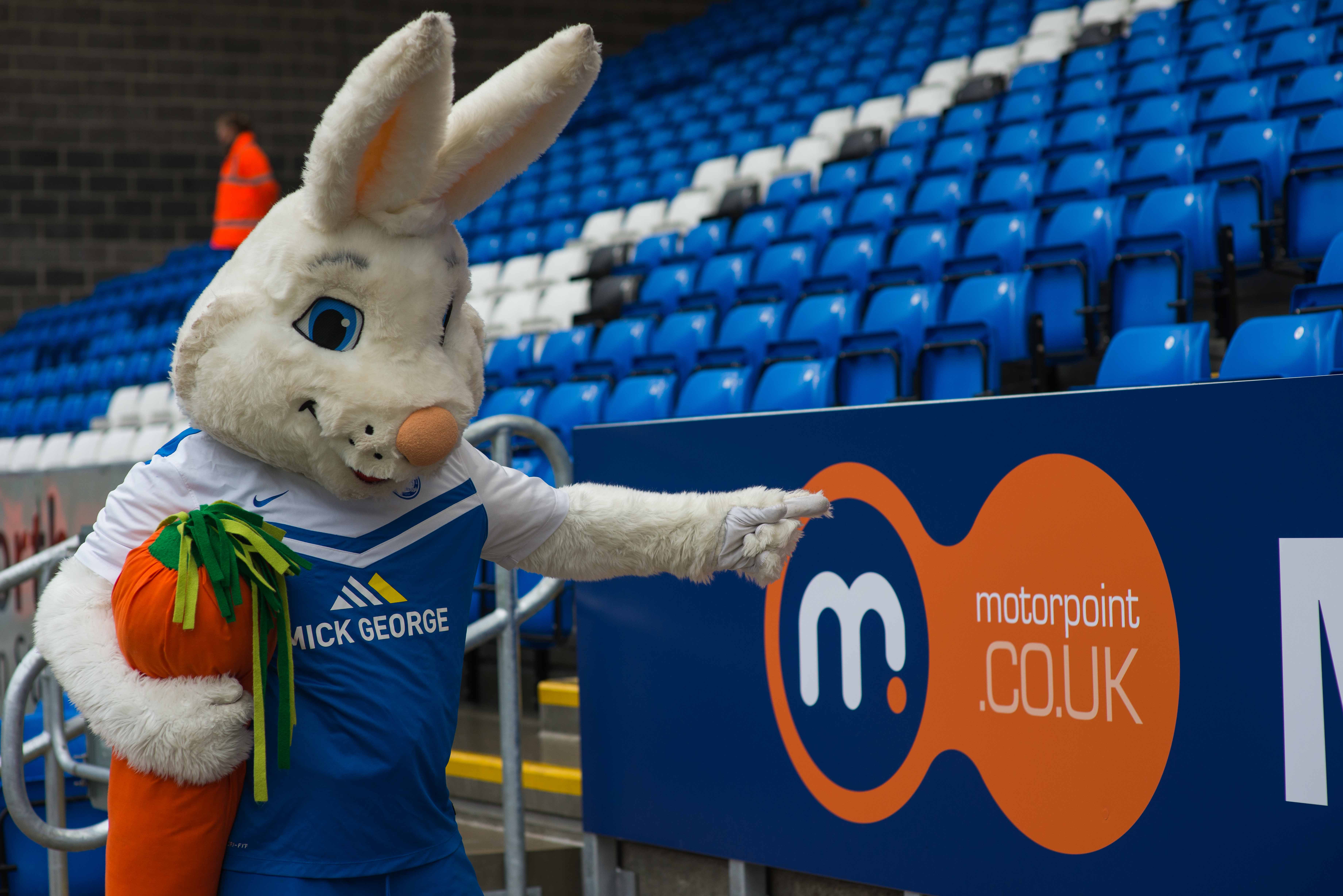 Posh Mascot next to Motorpoint Stand